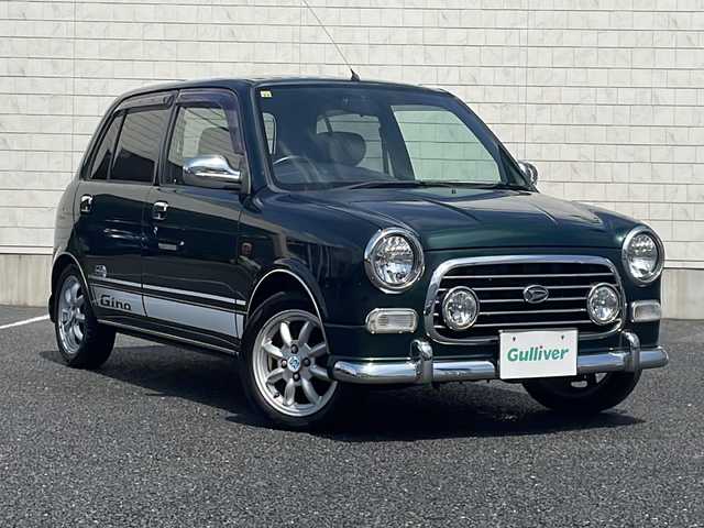 ダイハツ ミラ ジーノ ミニライトスペシャル 千葉県 2004(平16)年 2.5万km ブリティッシュグリーンマイカ ワンオーナー/低走行車両/ブラックレザーシート/純正アルミホイール/純正オーディオ/フォグランプ/ハロゲンライト/ACエアコン/リモコンキー/スペアキー/保証書/取扱説明書