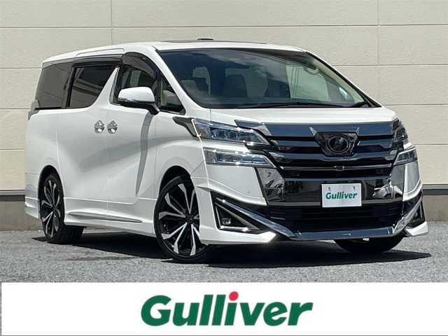 トヨタ ヴェルファイア VL 茨城県 2018(平30)年 4万km ホワイトパールクリスタルシャイン MOPナビ　TV走行中視聴可/フリップダウンモニター/OPレザーシート（後席シートヒーター/パノラミックビューモニター/3眼LEDヘッドライト/デジタルインナーミラー/モデリスタエアロ/モデリスタアルミホイール/JBLプレミアムサウンド/サンルーフ/両側パワースライドドア/HDMI/ビルドインETC/パワーシート/シートヒーター/オットマン/ステアリングヒーター
