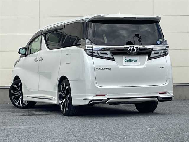 トヨタ ヴェルファイア VL 茨城県 2018(平30)年 4万km ホワイトパールクリスタルシャイン MOPナビ　TV走行中視聴可/フリップダウンモニター/OPレザーシート（後席シートヒーター/パノラミックビューモニター/3眼LEDヘッドライト/デジタルインナーミラー/モデリスタエアロ/モデリスタアルミホイール/JBLプレミアムサウンド/サンルーフ/両側パワースライドドア/HDMI/ビルドインETC/パワーシート/シートヒーター/オットマン/ステアリングヒーター