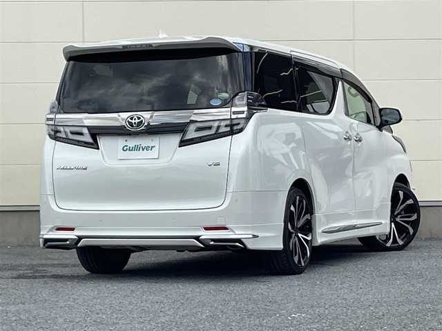 トヨタ ヴェルファイア VL 茨城県 2018(平30)年 4万km ホワイトパールクリスタルシャイン MOPナビ　TV走行中視聴可/フリップダウンモニター/OPレザーシート（後席シートヒーター/パノラミックビューモニター/3眼LEDヘッドライト/デジタルインナーミラー/モデリスタエアロ/モデリスタアルミホイール/JBLプレミアムサウンド/サンルーフ/両側パワースライドドア/HDMI/ビルドインETC/パワーシート/シートヒーター/オットマン/ステアリングヒーター