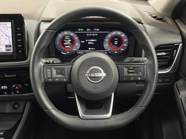 日産 エクストレイル X e－4ORCE 兵庫県 2022(令4)年 2.2万km ダイヤモンドブラック ・純正９インチナビ（MJ322D-L）/CD/DVD/TV/Bluetooth/SD/・バックカメラ/・ビルトインＥＴＣ2.0/・プロパイロット/・サイドエアバッグ〈前席〉/・カーテンエアバッグ/・ヒルスタートアシスト/・アドバンスドヒルディセントコントロール/・インテリジェント エマージェンシーブレーキ/・踏み間違い衝突防止アシスト/・標識検知機能/・前方衝突予測警報/・ふらつき警報/・車線逸脱防止支援システム/・車線逸脱警報/・後側方衝突防止支援システム/・後側方車両検知警報/・後退時車両検知警報/・クルーズコントロール/・パワーバックドア/・前席パワーシート/・全席シートヒーター/・防水セルクロスシート/・ステアリングヒーター/・ハイビームアシスト/・e-Pedal/・社外ドライブレコーダー（DRV-350）/・純正フロアマット/・純正アルミホイール/・ルーフレール/・インテリジェントキー