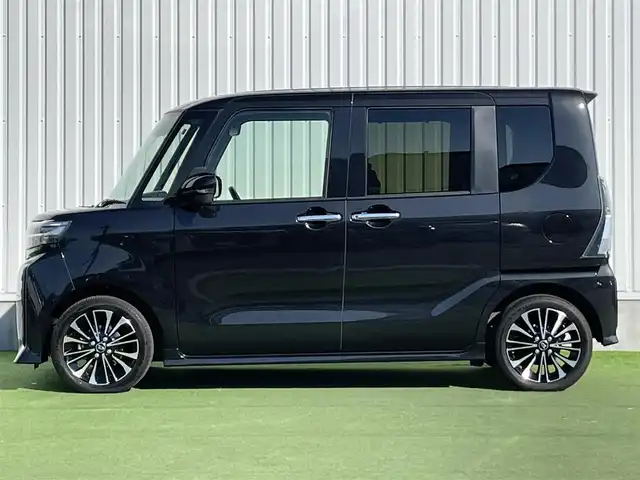 ダイハツ タント カスタム RS 香川県 2023(令5)年 2.3万km ブラックマイカメタリック スマートアシストIII　/・衝突警報機能/・衝突回避支援ブレーキ機能/・誤発進抑制制御機能/・車線逸脱警報機能・車線逸脱抑制制御機能/・先行車発進お知らせ機能/・オートハイビーム機能/パナソニックＳＤナビ　【CN-5310WD】/(フルセグTV/DVD/BT)/パノラマビューモニター/両側パワースライドドア/ハーフレザーシート/前席シートヒーター/革巻きステアリング　/ステアリングリモコン/LEDヘッドライト　/LEDフォグライト　/電動パーキングブレーキ/オートホールド/純正15インチアルミホイール/プッシュスタート/スペアキー有/ISOFIX