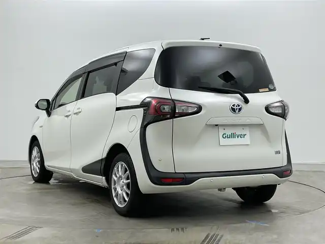 トヨタ シエンタ ハイブリッド 岡山県 2018(平30)年 2.1万km ホワイトパールクリスタルシャイン 純正９インチナビ　(NSZT-Y68T)/【CD/DVD/BT/フルセグ】/両側電動スライドドア　/全方位カメラ　/ビルトインＥＴＣ　/シートヒーター　前席　/ＬＥＤヘッドライト/クルーズコントロール　/ドライブレコーダー　前側/ステアリングヒーター　/コーナーセンサー　前後/禁煙車/アイドリングストップ/フォグライト/オートハイビーム/オートエアコン/踏み間違い防止/レーンアシスト