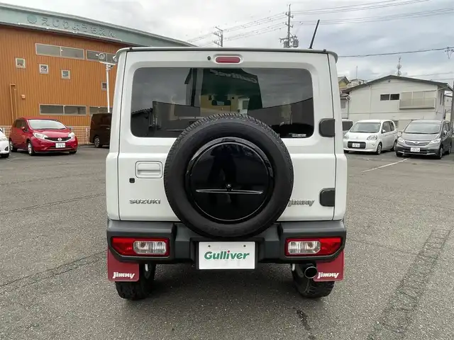 スズキ ジムニー XC 静岡県 2019(令1)年 8.8万km ピュアホワイトP ワンオーナー/スズキセーフティサポート/・デュアルセンサーブレーキサポート/・車線逸脱警報機能/・ふらつき警報機能/・標識認識機能/・ハイビームアシスト/・先行車発進お知らせ機能/ディーラーオプションナビ/・フルセグ/Bluetooth/DVD/SD/CD/バックカメラ/ナビ一体型ドライブレコーダー（前方向）/クルーズコントロール/プッシュスタート/スマートキーｘ２/前席シートヒーター/ホーネット製　ガラスリッド/オートライト/ステアリングリモコン/純正ゴムマット/ボンネットダンパー/社外柿本マフラー/純正マッドフラップ/ドアバイザー/ビルトインETC/オートライト/新車時保証書/取扱説明書