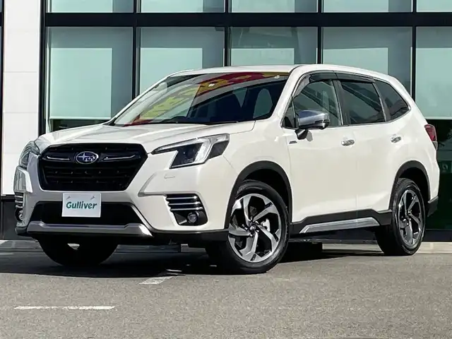 スバル フォレスター ハイブリッド アドバンス 和歌山県 2022(令4)年 1.3万km クリスタルホワイトP 純正ナビ（CN-FX800D）/バック・カメラ/フルセグTV/TVキャンセラー/（AM/FM/CD/DVD/BT/Bluray）/横滑り防止/BSM/衝突軽減ブレーキ/レーダークルコン/レーンキープアシスト/ビルトインETC/ドライブレコーダー/デジタルインナーミラー/シートヒーター/シートメモリー/パワーシート/ステアリングヒーター/パドルシフト/ハーフレザーシート/オートライト/電動リアゲート/
