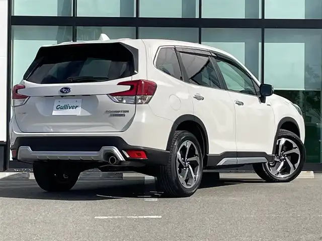 スバル フォレスター ハイブリッド アドバンス 和歌山県 2022(令4)年 1.3万km クリスタルホワイトP 純正ナビ（CN-FX800D）/バック・カメラ/フルセグTV/TVキャンセラー/（AM/FM/CD/DVD/BT/Bluray）/横滑り防止/BSM/衝突軽減ブレーキ/レーダークルコン/レーンキープアシスト/ビルトインETC/ドライブレコーダー/デジタルインナーミラー/シートヒーター/シートメモリー/パワーシート/ステアリングヒーター/パドルシフト/ハーフレザーシート/オートライト/電動リアゲート/