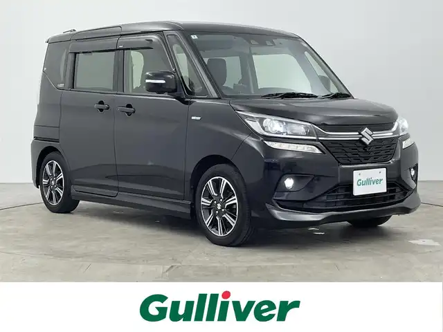 スズキ ソリオ バンディット HV MV 大分県 2020(令2)年 6.7万km スーパーブラックパール 社外ナビ/（フルセグ/CD/DVD/Bluetooth）/衝突軽減ブレーキ/レーダークルーズコントロール/レーンアシスト/クリアランスソナー/オートハイビーム/全方位カメラ/前後ドライブレコーダー/両側パワースライドドア/パドルシフト/ステアリングスイッチ/シートヒーター/電動格納ミラー