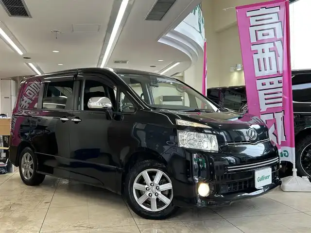 トヨタ ヴォクシー ZS 煌Ⅱ 東京都 2009(平21)年 9.6万km ブラック 社外ナビ　CN-RE05WD/(FM/AM/フルセグTV/BT/CD/DVD)/ALPINEフリップダウンモニター/(TMX-R3000)/パドルシフト/電動格納ミラー/フォグランプ/ETC/ウォークスルー/純正フロアマット/スマートキー