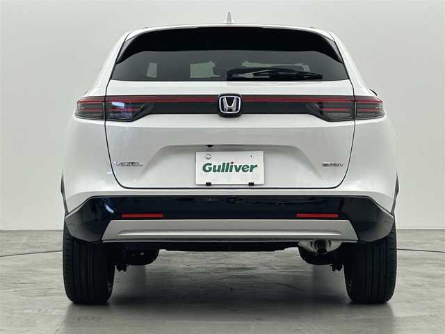 ホンダ ヴェゼル ハイブリッド e:HEV Z 福岡県 2025(令7)年 0.1万km未満 プラチナホワイトパール 登録済未使用車　/純正ナビ　/バックカメラ　/ビルトインＥＴＣ２．０　/置くだけ充電　/ＡＣＣ　/コーナーセンサー　/衝突軽減　/レーンキープ　/踏み間違い防止　/ＢＳＭ　/パドルシフト　/パワーリアゲート　/シートヒーター
