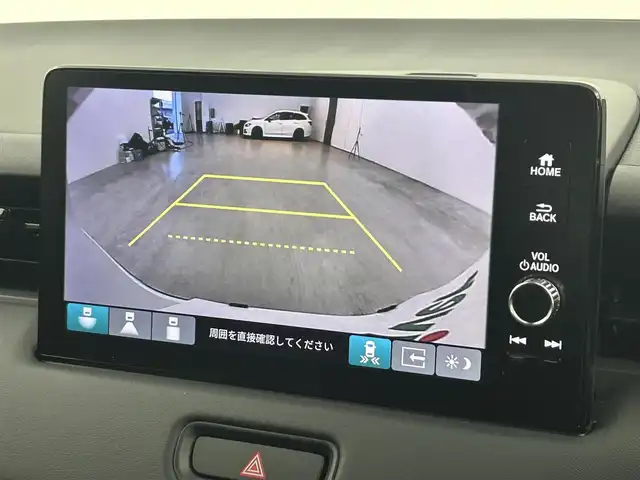 ホンダ ヴェゼル ハイブリッド e:HEV Z 福岡県 2025(令7)年 0.1万km未満 プラチナホワイトパール 登録済未使用車　/純正ナビ　/バックカメラ　/ビルトインＥＴＣ２．０　/置くだけ充電　/ＡＣＣ　/コーナーセンサー　/衝突軽減　/レーンキープ　/踏み間違い防止　/ＢＳＭ　/パドルシフト　/パワーリアゲート　/シートヒーター