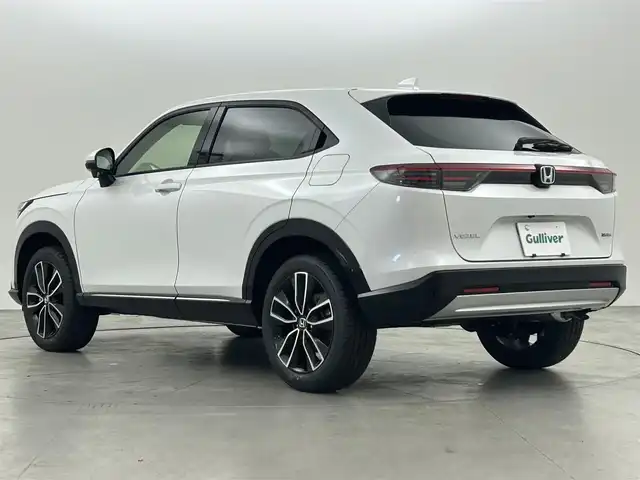 ホンダ ヴェゼル ハイブリッド e:HEV Z 福岡県 2025(令7)年 0.1万km未満 プラチナホワイトパール 登録済未使用車　/純正ナビ　/バックカメラ　/ビルトインＥＴＣ２．０　/置くだけ充電　/ＡＣＣ　/コーナーセンサー　/衝突軽減　/レーンキープ　/踏み間違い防止　/ＢＳＭ　/パドルシフト　/パワーリアゲート　/シートヒーター