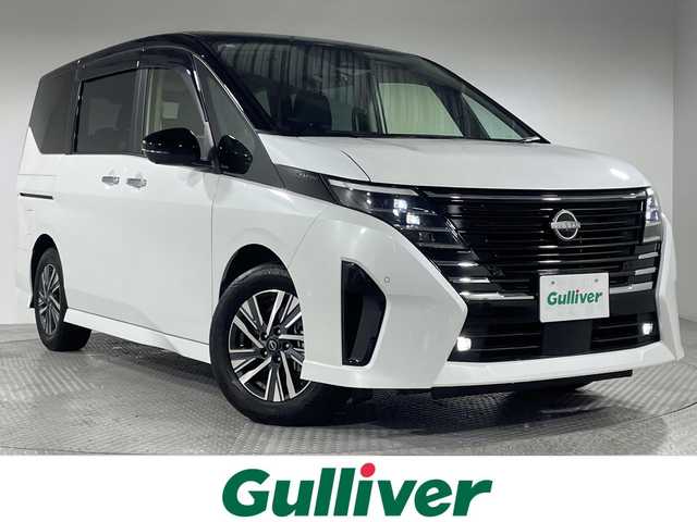 日産 セレナ e－パワー ハイウェイスター V 神奈川県 2023(令5)年 2.3万km パール プロパイロット/・プロパイロット/プロパイロット（ナビリンク機能付き）/・衝突回避ステアリングアシスト/・インテリジェント エマージェンシーブレーキ/・インテリジェント FCW（前方衝突予測警報）/・インテリジェント LI（車線逸脱防止支援システム）＋LDW（車線逸脱警報）/・インテリジェント BSI（後側方衝突防止支援システム）＋BSW（後側方車両検知警報）/・標識検知機能/・インテリジェント クルーズコントロール/純正12.3型ディスプレイオーディオ/・BT/TV/HDMI/USB/アマゾン/AppleCarPlay/AndroidAuto/AM/FM/アラウンドビューモニター/ヘッドレスト取り付け後後席モニター/寒冷地仕様/両側電動スライドドア/AC100V/ビルトインETC2.0/Qi充電/SOSボタン/純正前後ドライブレコーダー/レザー(合皮)シート/・シートヒーター(D/N/二列目)/革巻きステアリング/・ステアリングスイッチ/・ステアリングヒーター/電動サイドブレーキ/・オートブレーキホールド/LEDヘッドライト/・フォグランプ/電動格納ミラー/ウィンカーミラー/純正フロアマット/純正ドアバイザー/純正16インチアルミホイール