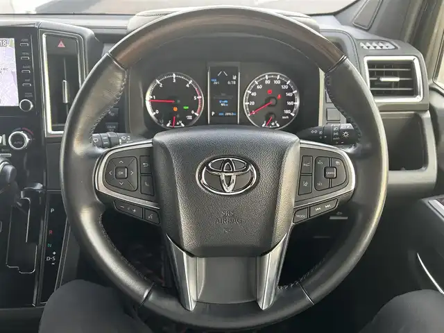 トヨタ グランエース プレミアム 千葉県 2021(令3)年 2.9万km ブラック 純正8インチナビ/(AM/FM、BT、TV、MIRACAST)/アラウンドビューモニター/衝突被害軽減システム/車線逸脱警報/オートクルーズコントロール/フリップダウンモニター/レザーシート/全席パワーシート/デジタルインナーミラー/両側パワースライドドア/横滑り防止装置/ETC/前後ドライブレコーダー/アイドリングストップ/LEDヘッドライト/フォグランプ/オートライト/ウィンカーミラー/電動格納ミラー/純正17インチAW/シートヒーター/エアシート/シートリフター/ステアリングヒーター/プッシュスタート/スマートキー/フロアマット/スペアキー/取扱説明書/保証書
