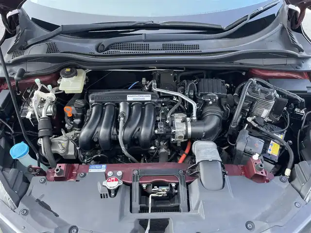 ホンダ ヴェゼル ハイブリッド Z 滋賀県 2015(平27)年 4万km プレミアムディープロッソパール 純正メモリナビ/・フルセグTV/FM/AM/SD/・CD/DVD/Bluetooth/バックカメラ/クルーズコントロール/シティブレーキアクティブシステム/・衝突回避・軽減ブレーキ/・誤発進抑制機能/オートブレーキホールド/純正ドライブレコーダー/ETC/ハーフレザーシート/前席シートヒーター/革巻きステアリング/パドルシフト/防眩インナーミラー/アイドリングストップ/純正LEDヘッドライト/オートライト/フォグランプ/電格ウィンカーミラー/ルーフレール/プッシュスタート/スマートキー×２/ドアバイザー/純正フロアマット