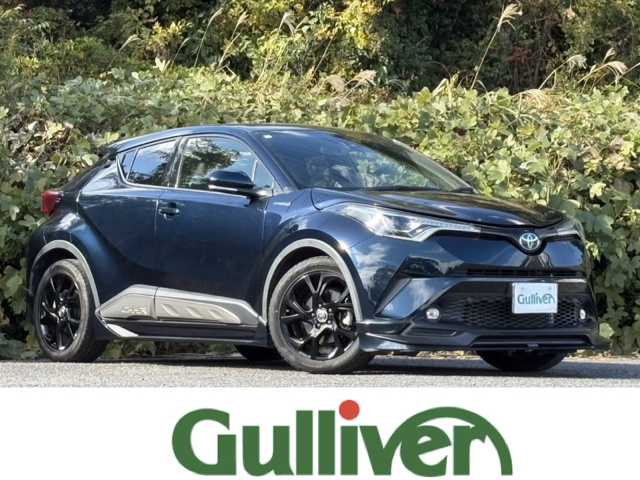 トヨタ Ｃ－ＨＲ G モード ネロ 大分県 2019(平31)年 7.1万km ブラッキッシュアゲハガラスフレーク TRDフルエアロ/トヨタセーフティセンス/ハーフレザーシート/純正メモリーナビ/バックカメラ/フルセグ /DVD/Bluetooth/シートヒーター/純正LEDヘッドライト/フォグランプ/オートライトコントロール/オートハイビームアシスト/シーケンシャルウインカー/アダプティブクルーズコントロール/レーンキープアシスト/スマートキー/エンジンプッシュスタート/ビルトインETC/純正18インチアルミ/前後クリアランスソナー