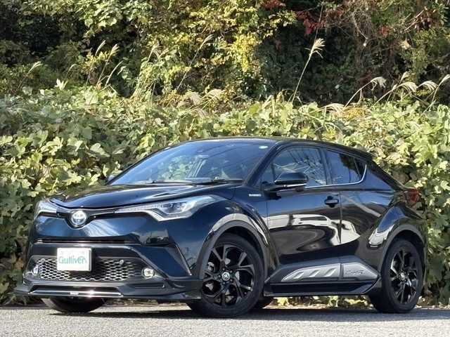 トヨタ Ｃ－ＨＲ G モード ネロ 大分県 2019(平31)年 7.1万km ブラッキッシュアゲハガラスフレーク TRDフルエアロ/トヨタセーフティセンス/ハーフレザーシート/純正メモリーナビ/バックカメラ/フルセグ /DVD/Bluetooth/シートヒーター/純正LEDヘッドライト/フォグランプ/オートライトコントロール/オートハイビームアシスト/シーケンシャルウインカー/アダプティブクルーズコントロール/レーンキープアシスト/スマートキー/エンジンプッシュスタート/ビルトインETC/純正18インチアルミ/前後クリアランスソナー