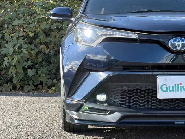 トヨタ Ｃ－ＨＲ G モード ネロ 大分県 2019(平31)年 7.1万km ブラッキッシュアゲハガラスフレーク TRDフルエアロ/トヨタセーフティセンス/ハーフレザーシート/純正メモリーナビ/バックカメラ/フルセグ /DVD/Bluetooth/シートヒーター/純正LEDヘッドライト/フォグランプ/オートライトコントロール/オートハイビームアシスト/シーケンシャルウインカー/アダプティブクルーズコントロール/レーンキープアシスト/スマートキー/エンジンプッシュスタート/ビルトインETC/純正18インチアルミ/前後クリアランスソナー