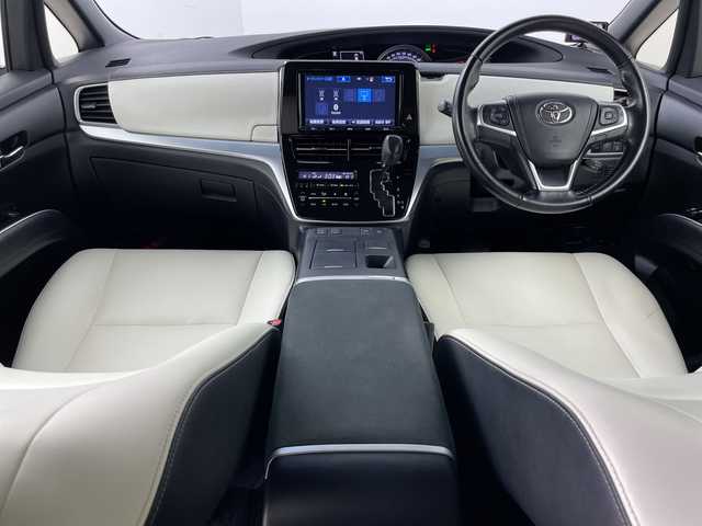 トヨタ エスティマ ハイブリッド アエラス スマート 道央・札幌 2017(平29)年 8.7万km ホワイトパールクリスタルシャイン ・4WD/・純正ナビ（NSZT-Y66T）/・CD&DVD&SD&BT&フルセグTV/・バックカメラ/・トヨタセーフティセンス/・クルーズコントロール/・純正フリップダウンモニター/・両側パワースライドドア/・レザーシート/・前席シートヒーター/・D席パワーシート/・TVキャンセラー/・ビルトインETC/・社外ドラレコ前方/・AC100V/1500W/・LEDヘッドライト/・オートライト/・オートマチックハイビーム/・スマートキー/・プッシュスタート/・保証書/・取扱説明書