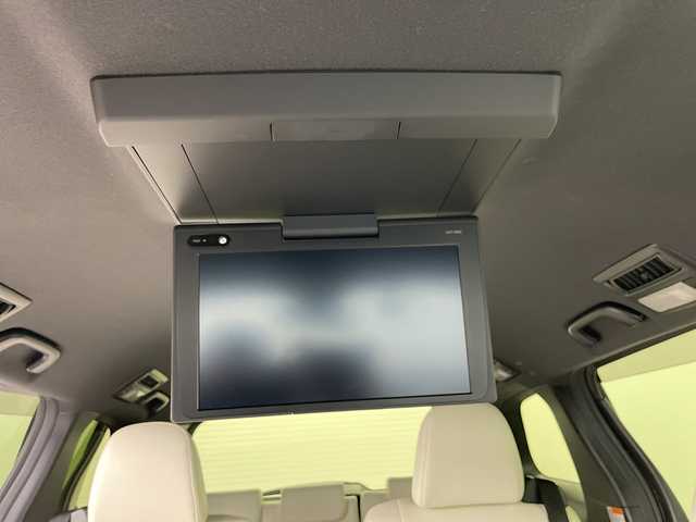 トヨタ エスティマ ハイブリッド アエラス スマート 道央・札幌 2017(平29)年 8.7万km ホワイトパールクリスタルシャイン ・4WD/・純正ナビ（NSZT-Y66T）/・CD&DVD&SD&BT&フルセグTV/・バックカメラ/・トヨタセーフティセンス/・クルーズコントロール/・純正フリップダウンモニター/・両側パワースライドドア/・レザーシート/・前席シートヒーター/・D席パワーシート/・TVキャンセラー/・ビルトインETC/・社外ドラレコ前方/・AC100V/1500W/・LEDヘッドライト/・オートライト/・オートマチックハイビーム/・スマートキー/・プッシュスタート/・保証書/・取扱説明書