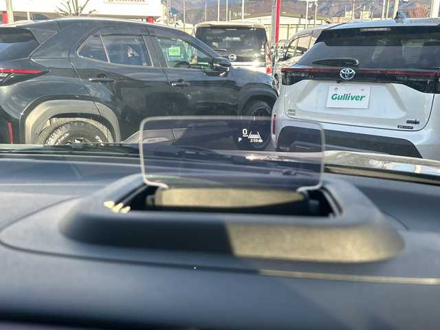 スズキ スペーシア カスタム HYBRID XS 長野県 2024(令6)年 0.4万km クールカーキPM 禁煙車/社外8インチナビ（CD/DVD/フルセグTV/Bluetooth）/セーフティサポート/・デュアルセンサーブレーキサポート/・誤発進抑制機能/・車線逸脱警報機能/・ふらつき警報機能/・先行車発進お知らせ機能/・ハイビームアシスト/・後退時ブレーキサポート/・後方誤発進抑制機能/・リアパーキングセンサー/・アダプティブクルーズコントロール/・標識認識機能/・ヘッドアップディスプレイ/バックカメラ/両側パワースライドドア/前席シートヒーター/ハーフレザーシート/ステアリングヒーター/革巻きステアリング/ステアリングスイッチ/LEDヘッドライト/フォグランプ/オートライト/電動パーキングブレーキ/ブレーキホールド/アイドリングストップ/スマートキー/Pスタート/電動格納ミラー/純正15インチAW/純正フロアマット