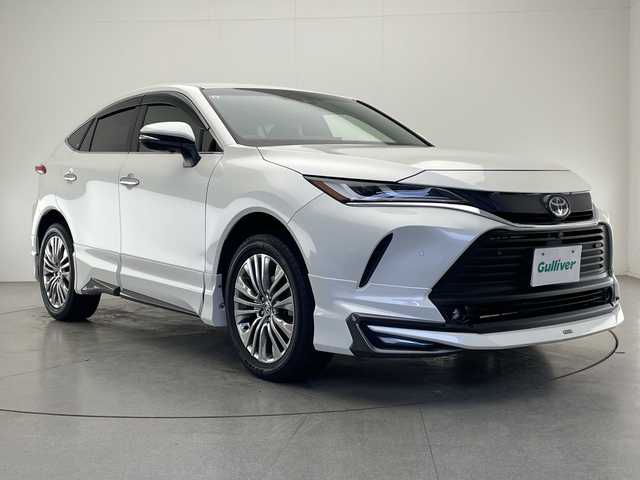 トヨタ ハリアー ハイブリッド Z レザーパッケージ 宮崎県 2021(令3)年 4万km ホワイトパールクリスタルシャイン モデリスタエアロ/純正ナビ・Bluetooth・FM/AM/パノラマミックビューモニター　/デジタルインナーミラー　/パワーバックドア　/ブラックレザーシート/Ｄ／Ｎ席シートヒーター・シートエアー/Ｄ／Ｎ席パワーシート　/ハンドルヒーター　/クルーズコントロール/オートライト/オートハイビーム/ビルトイン2.0ETC/エマージェンシーボタン/スマートキー/横滑り防止機能/ハンドルリモコン