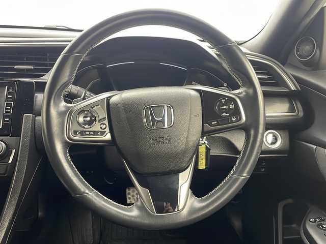 ホンダ シビック ハッチバック 茨城県 2021(令3)年 2.3万km プラチナホワイトパール 純正ナビ/・Bluetooth接続/・バックカメラ/・フルセグテレビ/ETC/ドライブレコーダー/LEDヘッドライト/パワーシート/パドルシフト/フロントフォグ/アイドリングストップ/クルーズコントロール/オートライト/ABS/横滑り防止装置/レーンアシストキープ/盗難防止装置/カーテンエアバッグ