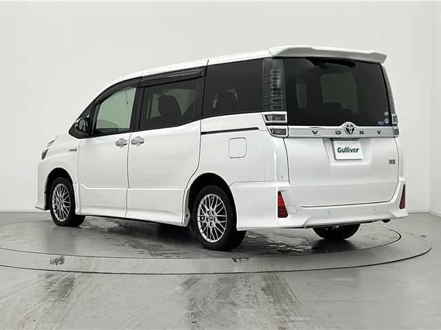 トヨタ ヴォクシー ハイブリッド ZS 煌Ⅱ 宮城県 2020(令2)年 3.5万km ホワイトパールクリスタルシャイン 純正9インチナビ/（CD/DVD/SD/BT/フルセグTV）/ビルトインETC/社外前後ドラレコ/純正１６インチアルミホイール/純正フロアマット/ドアバイザー/EVモード/三列シート/ウォークスルー/オートクルーズ/PCS/レーンキープアシスト