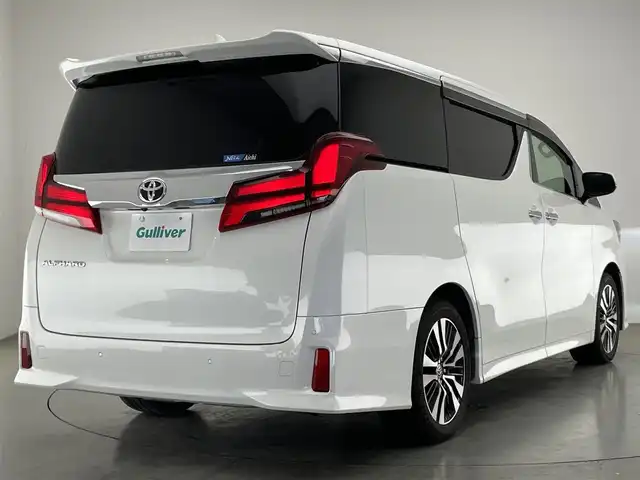 トヨタ アルファード S Cパッケージ 愛知県 2021(令3)年 5.5万km ホワイトパールクリスタルシャイン 純正ディスプレイナビ　フルセグＴＶ　ＤＶＤデッキ　ツインムーンルーフ　純正12.1型後席モニター　ＢＳＭ　黒革　シートヒーター　エアシート　デジタルインナーミラー　両側パワスラ　トヨタセーフティセンス　衝突軽減　追従クルコン　車線逸脱　ＡＣ１００Ｖ電源　三眼LEDライト　フォグランプ　オートライト　ステアリングヒーター　オットマン　電動パーキングブレーキ　電度リアゲート　ステアリングスイッチ　BSM　禁煙車