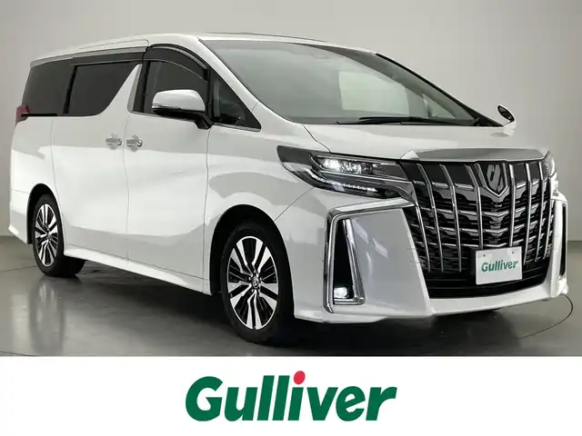 トヨタ アルファード S Cパッケージ 愛知県 2021(令3)年 5.5万km ホワイトパールクリスタルシャイン 純正ディスプレイナビ　フルセグＴＶ　ＤＶＤデッキ　ツインムーンルーフ　純正12.1型後席モニター　ＢＳＭ　黒革　シートヒーター　エアシート　デジタルインナーミラー　両側パワスラ　トヨタセーフティセンス　衝突軽減　追従クルコン　車線逸脱　ＡＣ１００Ｖ電源　三眼LEDライト　フォグランプ　オートライト　ステアリングヒーター　オットマン　電動パーキングブレーキ　電度リアゲート　ステアリングスイッチ　BSM　禁煙車