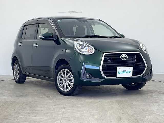 トヨタ パッソ モーダ 秋田県 2019(令1)年 4.4万km ダークエメラルドマイカ 4WD/寒冷地仕様/シートヒーター（D席）/フロントワイパーデアイサー /社外メモリナビ（DVD/BT/フルセグTV）/バックカメラ/前後ドライブレコーダー/エンジンスターター/スマートアシストIII/クリアランスソナー/オートハイビーム/アイドリングストップ/横滑り防止装置/ステアリングリモコン/LEDヘッドランプ/フォグランプ/保証書