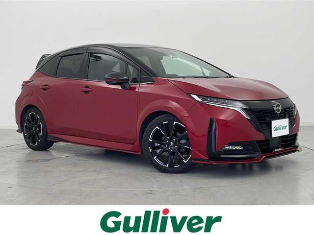 日産 オーラ ニスモ 宮城県 2022(令4)年 3.1万km ガーネットレッド/スーパーブラック 2トーン NISMO専用レカロシート/アラウンドビューモニター/プロパイロット/エマージェンシーブレーキ/車線逸脱警報/オートハイビームアシスト/ブラインドスポットモニター/前後コーナーセンサー/デジタルインナーミラー/純正ディスプレイオーディオ/・ナビゲーション機能/・USB.BT.HDMI/フルセグTV/前席シートヒーター/ステアリングヒーター/ステアリングスイッチ/置くだけ充電/電動パーキングブレーキ/ビルトインETC2.0/ドライブレコーダー（FR）/LEDヘッドライト/シーケンシャルランプ/プッシュスタート/スマートキー2個/社外AW付冬タイヤ積込/（196/65/15）/純正17インチアルミホイール/純正フロアマット