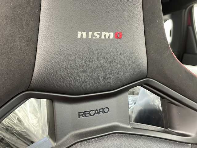 日産 オーラ ニスモ 宮城県 2022(令4)年 3.1万km ガーネットレッド/スーパーブラック 2トーン NISMO専用レカロシート/アラウンドビューモニター/プロパイロット/エマージェンシーブレーキ/車線逸脱警報/オートハイビームアシスト/ブラインドスポットモニター/前後コーナーセンサー/デジタルインナーミラー/純正ディスプレイオーディオ/・ナビゲーション機能/・USB.BT.HDMI/フルセグTV/前席シートヒーター/ステアリングヒーター/ステアリングスイッチ/置くだけ充電/電動パーキングブレーキ/ビルトインETC2.0/ドライブレコーダー（FR）/LEDヘッドライト/シーケンシャルランプ/プッシュスタート/スマートキー2個/社外AW付冬タイヤ積込/（196/65/15）/純正17インチアルミホイール/純正フロアマット