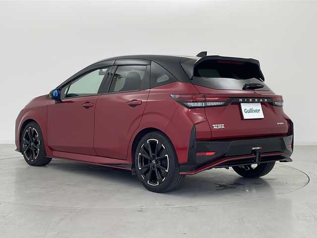 日産 オーラ ニスモ 宮城県 2022(令4)年 3.1万km ガーネットレッド/スーパーブラック 2トーン NISMO専用レカロシート/アラウンドビューモニター/プロパイロット/エマージェンシーブレーキ/車線逸脱警報/オートハイビームアシスト/ブラインドスポットモニター/前後コーナーセンサー/デジタルインナーミラー/純正ディスプレイオーディオ/・ナビゲーション機能/・USB.BT.HDMI/フルセグTV/前席シートヒーター/ステアリングヒーター/ステアリングスイッチ/置くだけ充電/電動パーキングブレーキ/ビルトインETC2.0/ドライブレコーダー（FR）/LEDヘッドライト/シーケンシャルランプ/プッシュスタート/スマートキー2個/社外AW付冬タイヤ積込/（196/65/15）/純正17インチアルミホイール/純正フロアマット