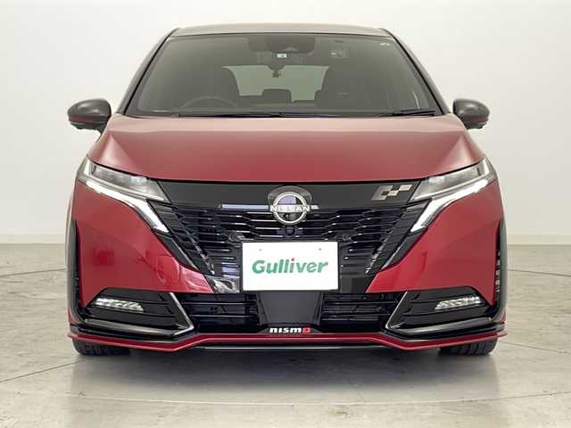 日産 オーラ ニスモ 宮城県 2022(令4)年 3.1万km ガーネットレッド/スーパーブラック 2トーン NISMO専用レカロシート/アラウンドビューモニター/プロパイロット/エマージェンシーブレーキ/車線逸脱警報/オートハイビームアシスト/ブラインドスポットモニター/前後コーナーセンサー/デジタルインナーミラー/純正ディスプレイオーディオ/・ナビゲーション機能/・USB.BT.HDMI/フルセグTV/前席シートヒーター/ステアリングヒーター/ステアリングスイッチ/置くだけ充電/電動パーキングブレーキ/ビルトインETC2.0/ドライブレコーダー（FR）/LEDヘッドライト/シーケンシャルランプ/プッシュスタート/スマートキー2個/社外AW付冬タイヤ積込/（196/65/15）/純正17インチアルミホイール/純正フロアマット
