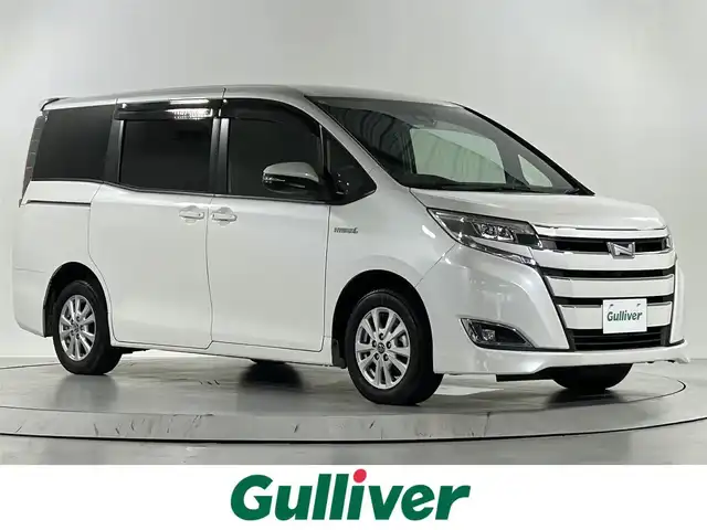 トヨタ ノア ハイブリッド G 佐賀県 2017(平29)年 4.9万km ホワイトパールクリスタルシャイン 社外アルパイン製11インチナビ【EX11Z】/【フルセグTV.CD.DVD.Bluetooth】/社外アルパイン製10.1インチフリップダウンモニター/バックカメラ/衝突被害軽システム/クルーズコントロール/車線逸脱警報/オートライト/オートマチックハイビーム/前方ドライブレコーダー/LEDヘッドライト/フォグライト/ビルトインETC/両側パワースライドドア/運転席・助手席シートヒーター/後席サンシェード/ISOFIX対応シート/シートバックテーブル/純正フロアマット/純正15インチアルミホイール/スマートキー/スペアキー×1/ウォークスルー/純正ドアバイザー