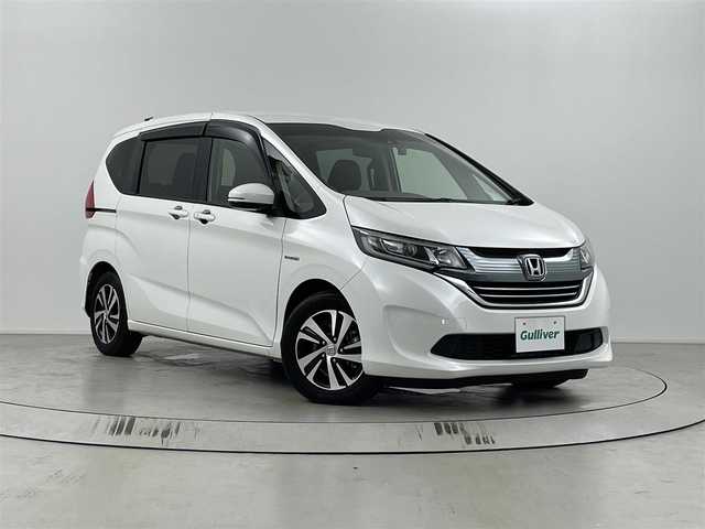 ホンダ フリード ハイブリット EX 埼玉県 2017(平29)年 3.4万km プラチナムホワイトパール ホンダセンシング/純正7インチメモリナビ(型式：VXM-185VFNi)/CD/DVD/Bluetooth/フルセグ/両側パワースライドドア/クルーズコントロール/バックカメラ/ビルトインETC/ドライブレコーダー/シートヒーター/純正15インチAW/純正フロアマット/プッシュスタート/スマートキー/スペアキー１本/取扱説明書