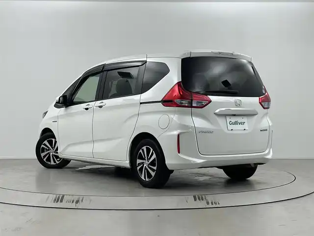 ホンダ フリード ハイブリット EX 埼玉県 2017(平29)年 3.4万km プラチナムホワイトパール ホンダセンシング/純正7インチメモリナビ(型式：VXM-185VFNi)/CD/DVD/Bluetooth/フルセグ/両側パワースライドドア/クルーズコントロール/バックカメラ/ビルトインETC/ドライブレコーダー/シートヒーター/純正15インチAW/純正フロアマット/プッシュスタート/スマートキー/スペアキー１本/取扱説明書