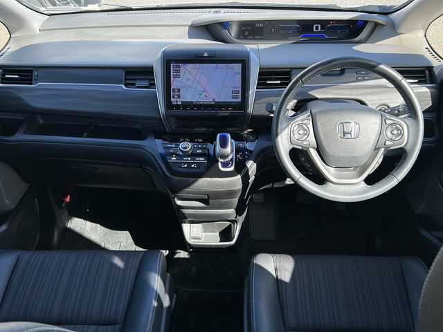 ホンダ フリード ハイブリット EX 石川県 2017(平29)年 3.4万km プラチナムホワイトパール 純正7インチメモリナビ(型式：VXM-185VFNi)/CD/DVD/Bluetooth/フルセグ/両側パワースライドドア/ビルトインETC/ドライブレコーダー/クルーズコントロール/バックカメラ/純正15インチAW/純正フロアマット/プッシュスタート/スマートキー/スペアキー１本