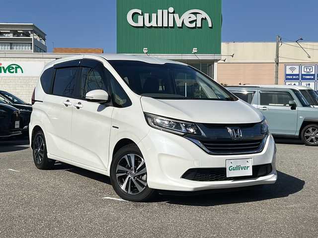 ホンダ フリード ハイブリット EX 石川県 2017(平29)年 3.4万km プラチナムホワイトパール 純正7インチメモリナビ(型式：VXM-185VFNi)/CD/DVD/Bluetooth/フルセグ/両側パワースライドドア/ビルトインETC/ドライブレコーダー/クルーズコントロール/バックカメラ/純正15インチAW/純正フロアマット/プッシュスタート/スマートキー/スペアキー１本