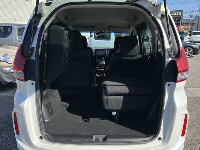 ホンダ フリード ハイブリット EX 石川県 2017(平29)年 3.4万km プラチナムホワイトパール 純正7インチメモリナビ(型式：VXM-185VFNi)/CD/DVD/Bluetooth/フルセグ/両側パワースライドドア/ビルトインETC/ドライブレコーダー/クルーズコントロール/バックカメラ/純正15インチAW/純正フロアマット/プッシュスタート/スマートキー/スペアキー１本