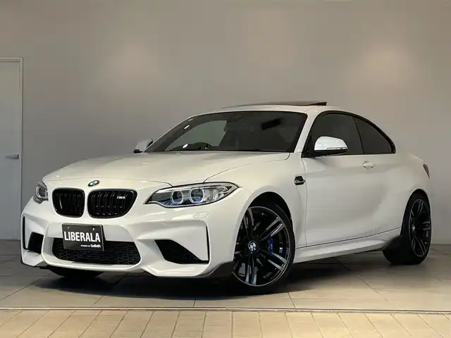 ＢＭＷ Ｍ２ 愛知県 2016(平28)年 4.9万km アルピンホワイトⅢ サンルーフ　/ハーマンカードンサウンド　/レザーシート　/シートヒーター　/純正ナビ　/Ｂｌｕｅｔｏｏｔｈ　/バックカメラ　/ＣＤ／ＤＶＤ　/インテリジェントセーフティー　/クルーズコントロール　/ＬＫＡ　/ＥＴＣ/プッシュスタート/ウィンカーミラー/アイドリングストップ/HID