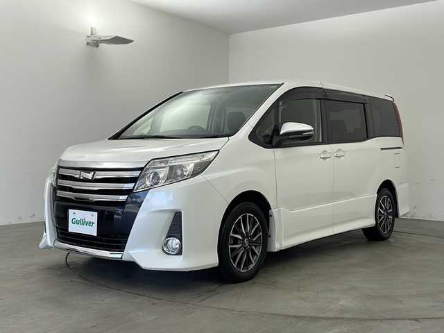 トヨタ ノア Si 兵庫県 2014(平26)年 7.8万km ホワイトパールクリスタルシャイン ・純正ナビ（フルセグ・BT・DVD・CD・SD）/・バックカメラ/・ビルトインETC/・パワースライドドア/・LEDオートライト/・フォグランプ/・ステアリングリモコン/・アイドリングストップ/・横滑り防止/・後席サンシェード/・ドライブレコーダー/・フロアマット/・純正16インチアルミホイール/・MTモード付AT/・ドアバイザー/・シートリフター/・スマートキー/・プッシュスタート/・ＡＬＬ AUTO PW/・電動格納ミラー