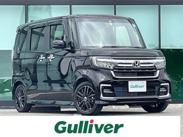ホンダ Ｎ ＢＯＸ カスタム L ターボ 和歌山県 2022(令4)年 1.1万km クリスタルブラックパール 純正ナビ/バックカメラ/フルセグTV/BT/CD/DVD/衝突軽減ブレーキ/レーンキープアシスト/後方コーナーセンサー/レーダークルコン/オートライト/両側パワスラ/ビルトインETC/ドラレコ/シートヒーター/ステアリングリモコン/ハーフレザーシート/パドルシフト/LEDヘッドライト/フォグランプ/オートホールド