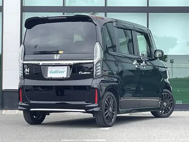 ホンダ Ｎ ＢＯＸ カスタム L ターボ 和歌山県 2022(令4)年 1.1万km クリスタルブラックパール 純正ナビ/バックカメラ/フルセグTV/BT/CD/DVD/衝突軽減ブレーキ/レーンキープアシスト/後方コーナーセンサー/レーダークルコン/オートライト/両側パワスラ/ビルトインETC/ドラレコ/シートヒーター/ステアリングリモコン/ハーフレザーシート/パドルシフト/LEDヘッドライト/フォグランプ/オートホールド