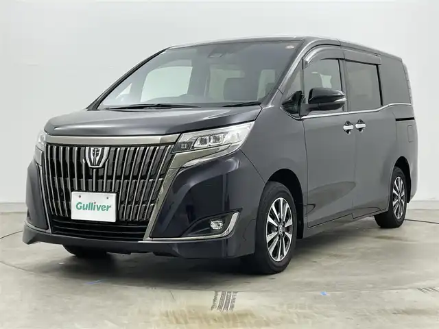 トヨタ エスクァイア Gi プレミアムパッケージ ブラックテーラード 岡山県 2021(令3)年 5.9万km スパークリングブラックパールクリスタルシャイン 純正9インチSDナビ【NSZT-Y68T】/(CD/DVD/BT/フルセグ)/純正12インチフリップダウンモニター/バックカメラ/ビルトインETC/両側パワースライドドア/トヨタセーフティセンス/・衝突軽減ブレーキ/・先行車発信通知/・横滑り防止装置/・レーンキープアシスト/・オートハイビーム/前後コーナーセンサー/クルーズコントロール/ハーフレザーシート/D/N席シートヒーター/LEDヘッドライト/スマートキー/プッシュスタート/ステアリングヒーター