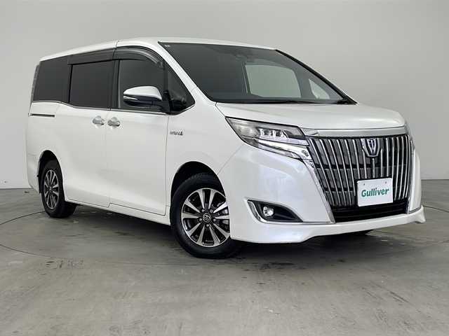 トヨタ エスクァイア ハイブリッド Xi 兵庫県 2018(平30)年 3.4万km ホワイトパールクリスタルシャイン ・ワンオーナー/・トヨタセーフティーセンス/・プリクラッシュセーフティ/・レーンディバチャーアラート/・先行車発進お知らせ/・オートマチックハイビーム/・クルーズコントロール/・純正9インチナビ＆TV＆BT＆HDMI＆DVD/・バックカメラ/・両側パワースライドドア/・スマートキー/・スペアキー/・プッシュスタート/・ビルトインETC/・前方ドライブレコーダー/・前席シートヒーター/・横滑り防止装置/・フロアマット/・ステアリングスイッチ/・後席サンシェード/・LEDライト/・フォグ/・オートライト/・電動格納ミラー/・シートリフター/・純正15インチアルミホイール