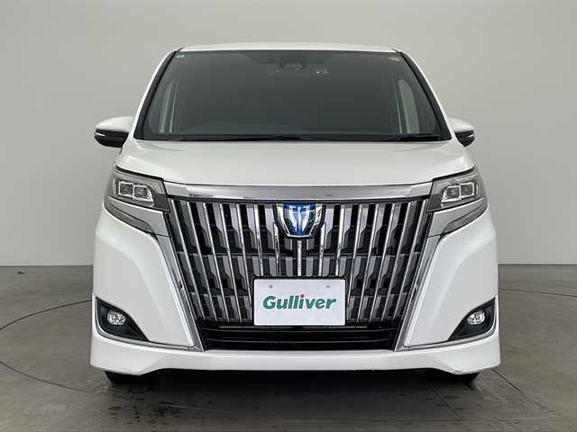 トヨタ エスクァイア ハイブリッド Xi 兵庫県 2018(平30)年 3.4万km ホワイトパールクリスタルシャイン ・ワンオーナー/・トヨタセーフティーセンス/・プリクラッシュセーフティ/・レーンディバチャーアラート/・先行車発進お知らせ/・オートマチックハイビーム/・クルーズコントロール/・純正9インチナビ＆TV＆BT＆HDMI＆DVD/・バックカメラ/・両側パワースライドドア/・スマートキー/・スペアキー/・プッシュスタート/・ビルトインETC/・前方ドライブレコーダー/・前席シートヒーター/・横滑り防止装置/・フロアマット/・ステアリングスイッチ/・後席サンシェード/・LEDライト/・フォグ/・オートライト/・電動格納ミラー/・シートリフター/・純正15インチアルミホイール