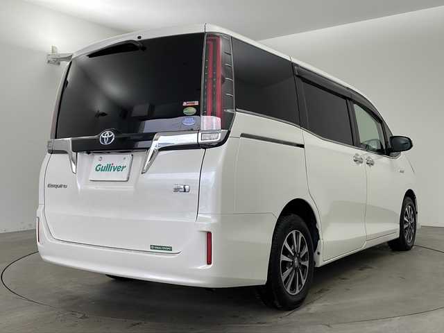トヨタ エスクァイア ハイブリッド Xi 兵庫県 2018(平30)年 3.4万km ホワイトパールクリスタルシャイン ・ワンオーナー/・トヨタセーフティーセンス/・プリクラッシュセーフティ/・レーンディバチャーアラート/・先行車発進お知らせ/・オートマチックハイビーム/・クルーズコントロール/・純正9インチナビ＆TV＆BT＆HDMI＆DVD/・バックカメラ/・両側パワースライドドア/・スマートキー/・スペアキー/・プッシュスタート/・ビルトインETC/・前方ドライブレコーダー/・前席シートヒーター/・横滑り防止装置/・フロアマット/・ステアリングスイッチ/・後席サンシェード/・LEDライト/・フォグ/・オートライト/・電動格納ミラー/・シートリフター/・純正15インチアルミホイール