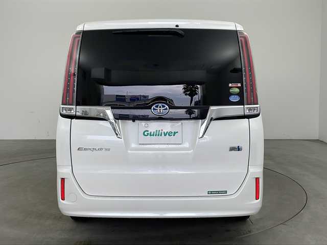 トヨタ エスクァイア ハイブリッド Xi 兵庫県 2018(平30)年 3.4万km ホワイトパールクリスタルシャイン ・ワンオーナー/・トヨタセーフティーセンス/・プリクラッシュセーフティ/・レーンディバチャーアラート/・先行車発進お知らせ/・オートマチックハイビーム/・クルーズコントロール/・純正9インチナビ＆TV＆BT＆HDMI＆DVD/・バックカメラ/・両側パワースライドドア/・スマートキー/・スペアキー/・プッシュスタート/・ビルトインETC/・前方ドライブレコーダー/・前席シートヒーター/・横滑り防止装置/・フロアマット/・ステアリングスイッチ/・後席サンシェード/・LEDライト/・フォグ/・オートライト/・電動格納ミラー/・シートリフター/・純正15インチアルミホイール