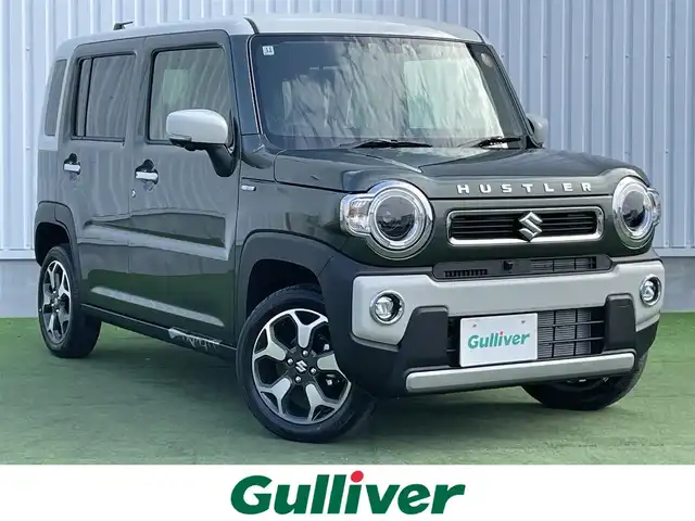 スズキ ハスラー HYBRID X 香川県 2025(令7)年 0.1千km クールカーキパールメタリック/ソフトベージュメタリック HV　X　全方位モニター付きナビゲーション＆スズキセーフティサポート(217800円)/登録時走行距離：5km/届出済未使用車/メーカー純正9型メモリナビ/　CD DVD BT フルセグTV/全方位カメラ/デュアルカメラブレーキサポート/レーンキープアシスト/レーダークルーズコントロール/クリアランスソナー/LEDヘッドライト/オートライト/フォグランプ/レベライザヘッドライト/横滑り防止装置/アイドリングストップ/ハーフレザーシート/シートヒーター/革巻きステアリング/ステアリングスイッチ/プッシュスタート/スマートキー/スペアキー/取扱説明書/保証書